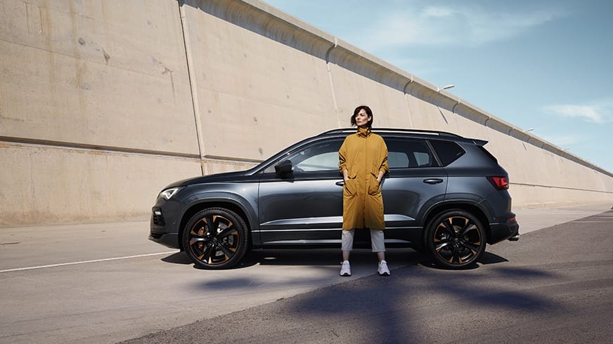 woman-standing-next-to-cupra-ateca-2020-rodium-grey-colour